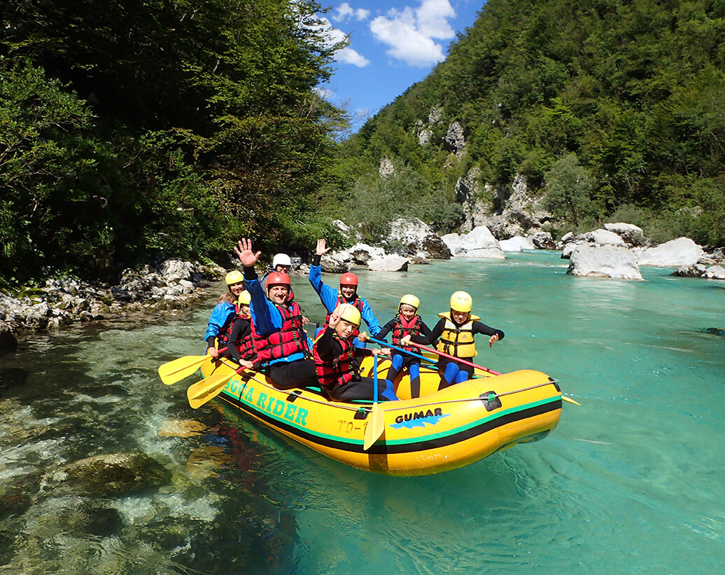 Family rafting with children, Bovec | All family is enjoying Soča river
