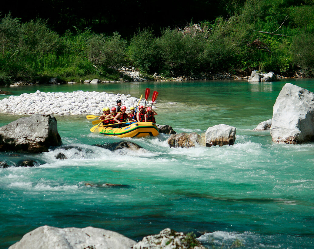 Whitewater Rafting Tour on Soča river | Rafting is a program of rafting kayaking canyoning package