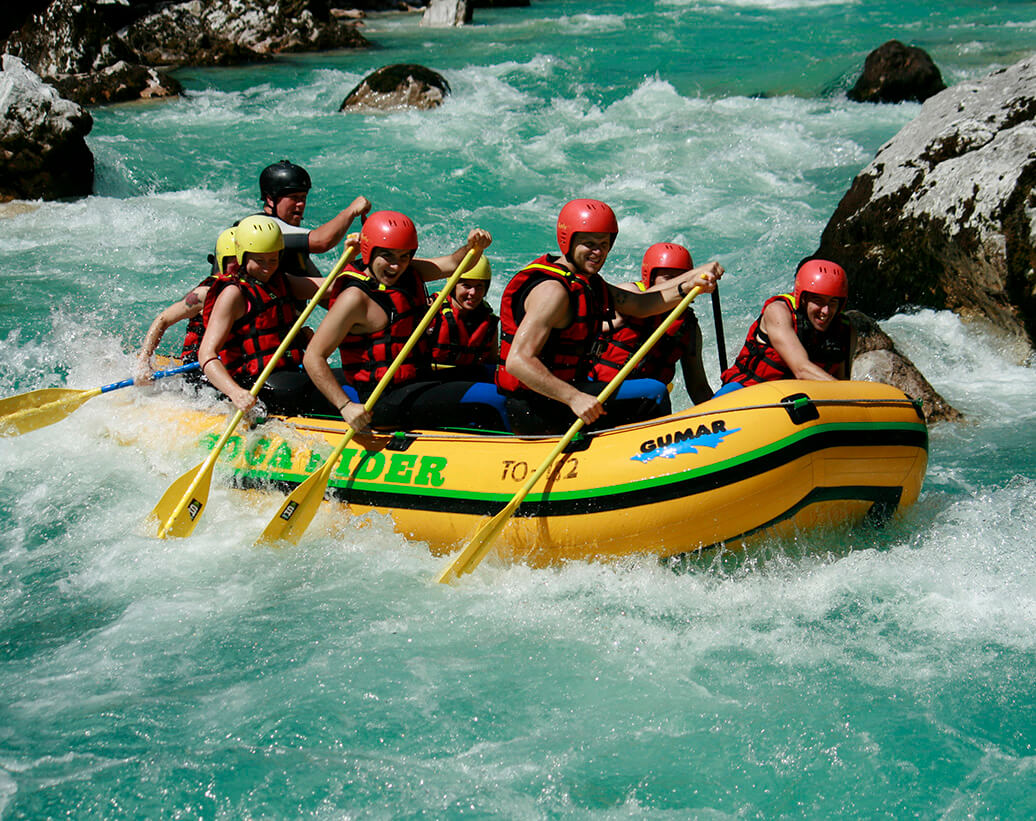 Rafting Slovenia, Bovec, Soča | Rafters are paddling hard on Soča river, Bovec, Slovenia